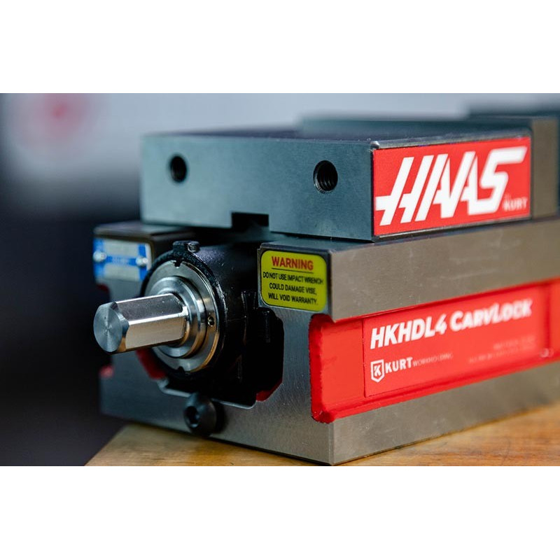 Двопозиційні лещата з фіксованою кулачкою 100 мм (4 дюйми), отвір 75 мм (3 дюйми), затиск Haas від Kurt