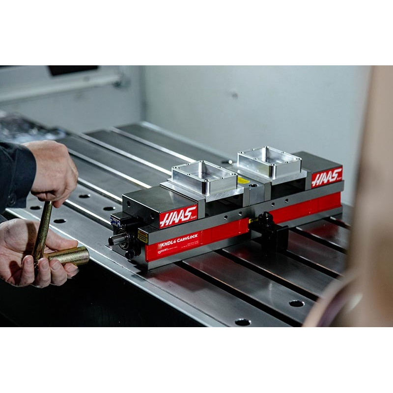 Двопозиційні лещата з фіксованою кулачкою 100 мм (4 дюйми), отвір 75 мм (3 дюйми), затиск Haas від Kurt