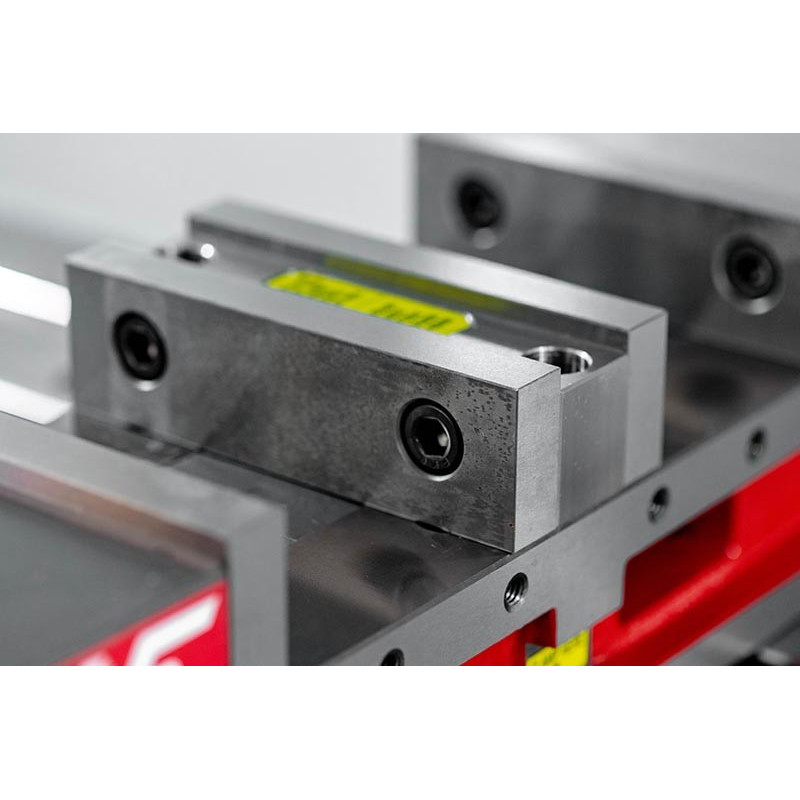 Двопозиційні лещата з фіксованою кулачкою 100 мм (4 дюйми), отвір 75 мм (3 дюйми), затиск Haas від Kurt