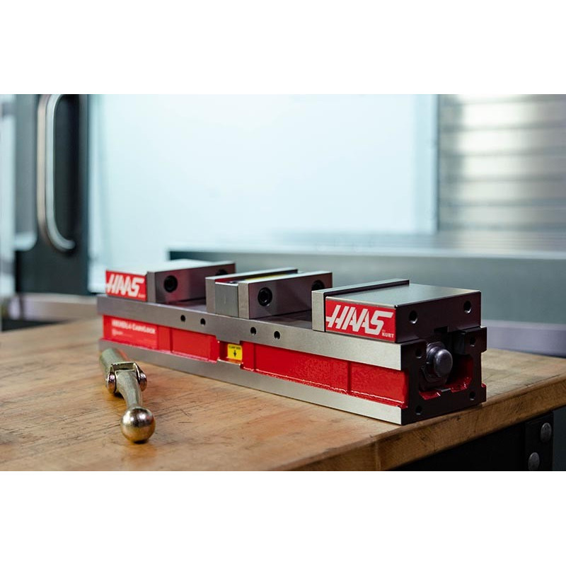 Двопозиційні лещата з фіксованою кулачкою 100 мм (4 дюйми), отвір 75 мм (3 дюйми), затиск Haas від Kurt