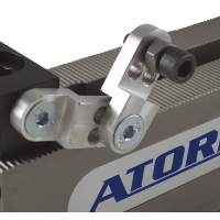 Регульований обмежувач для багатозатискних напрямних рейок